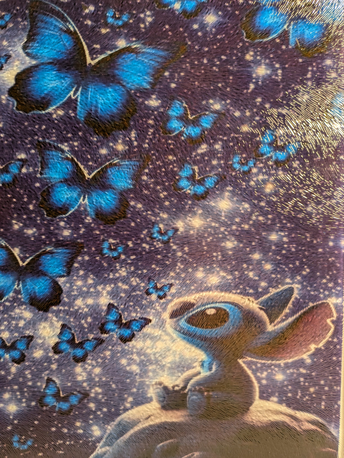 Celestial bunny and blue butterflies 8x10 glass cutting board full view