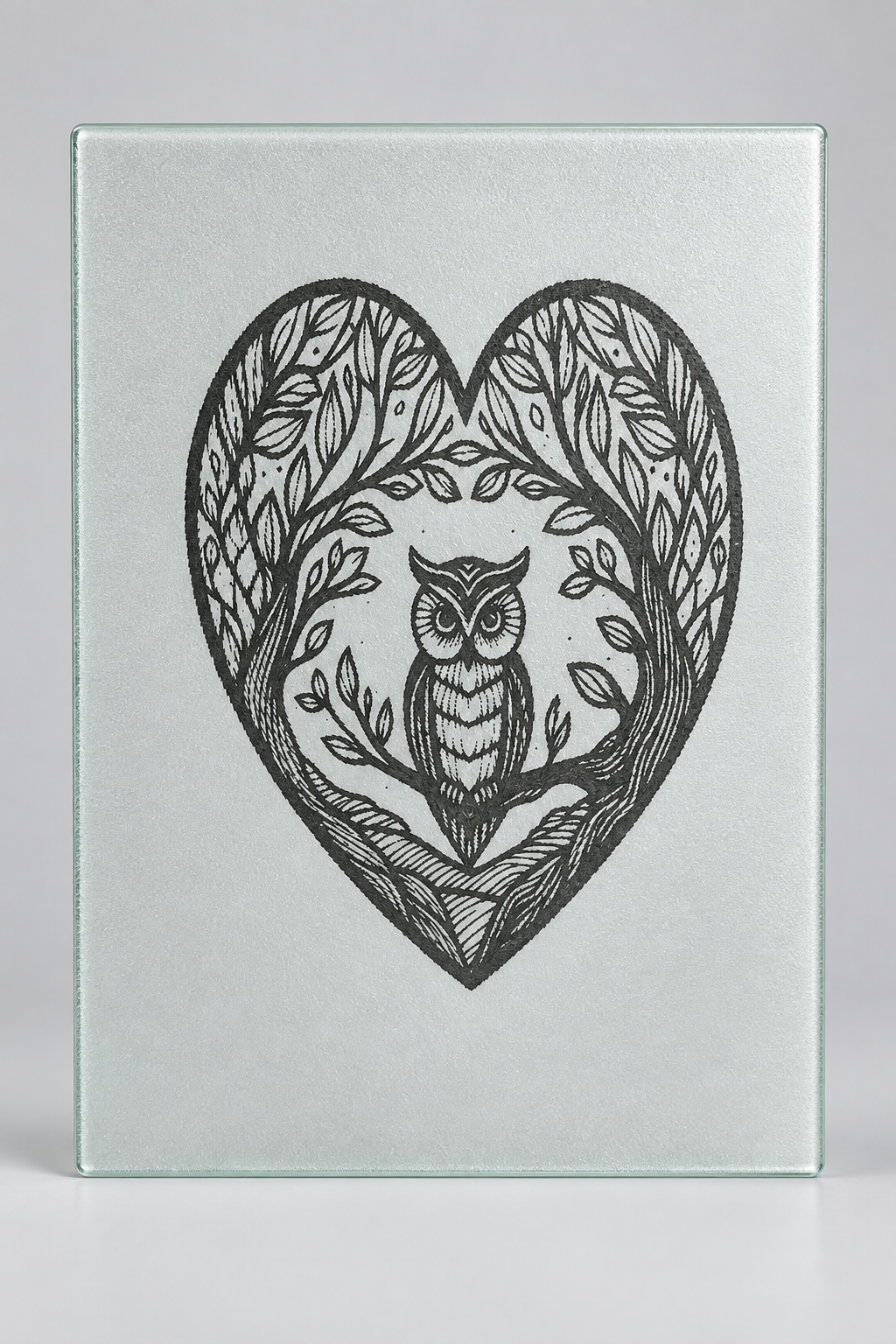 Laser engraved owl heart glass cutting board - full product shot