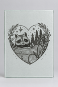 Laser engraved glass cutting board with raccoon heart woodland design - packshot 1